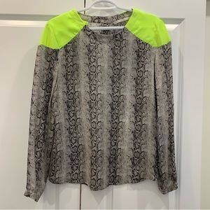 Snake print blouse with neon shoulder detail, and button up back